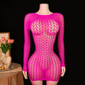 Hot pink fishnet mini dress on mannequin – dark background lifestyle shot