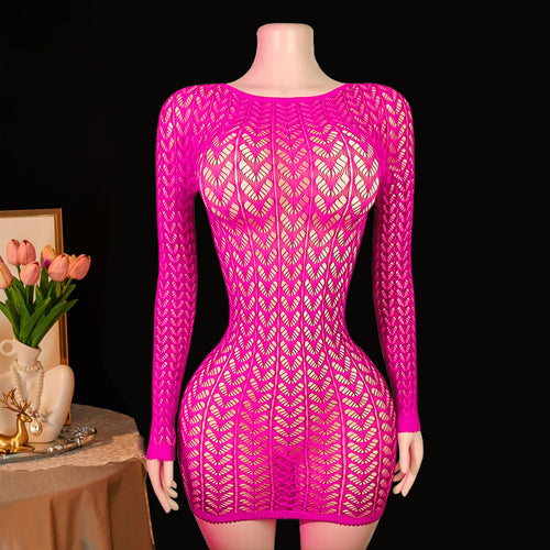 Hot pink fishnet mini dress on mannequin – dark background lifestyle shot